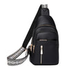 Black PU leather crossbody chest bag with patterned strap and gold hardware