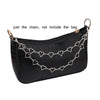 Black faux leather bag featuring a multi-layer silver chain strap with heart pendants