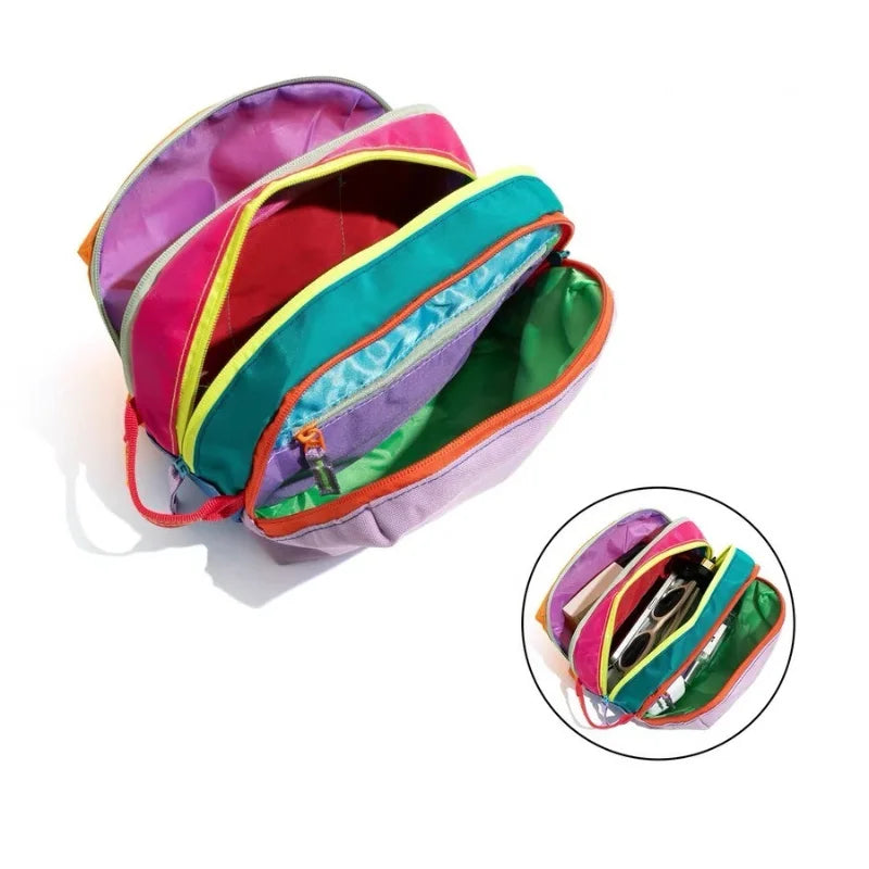 A vibrant, lightweight travel makeup bag featuring multiple colorful compartments in purple, pink, red, and green.