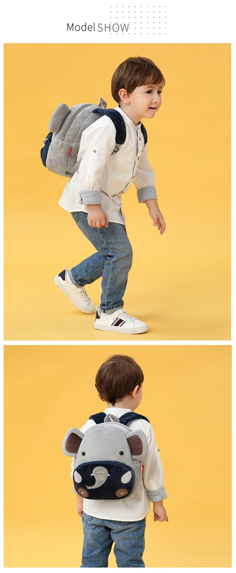 A young boy wearing a gray cartoon animal plush backpack while standing against a yellow background.