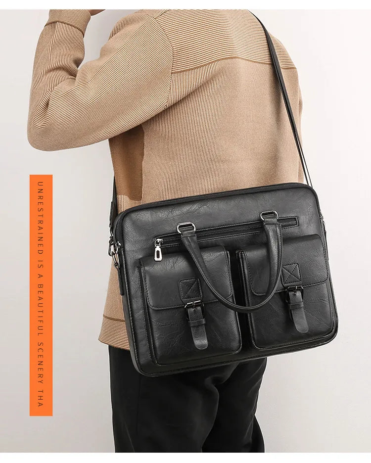 A tan sweater-clad person holds a black PU leather business briefcase bag.