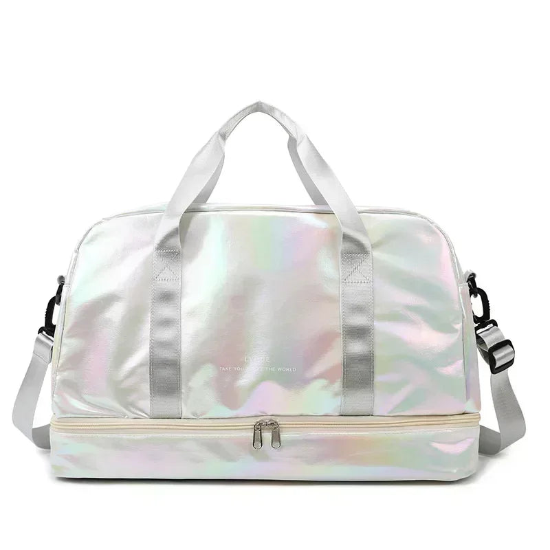 A silver iridescent nylon travel bag with light pink accents and handles.