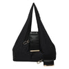 Black stylish cloth storage pouch with gold hardware and a leather strap attached.