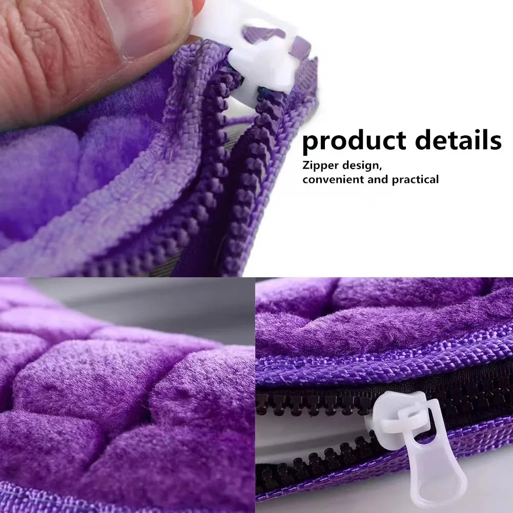 Close-up of a purple plush waterproof toilet seat cover with a zipper design.
