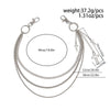 Silver punk star chain belt with pearl accents featuring multiple strands and a cross charm