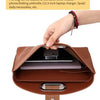 A brown leather laptop briefcase is shown open, displaying a laptop and other items.
