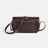 A dark brown genuine leather square shoulder crossbody bag with gold hardware.