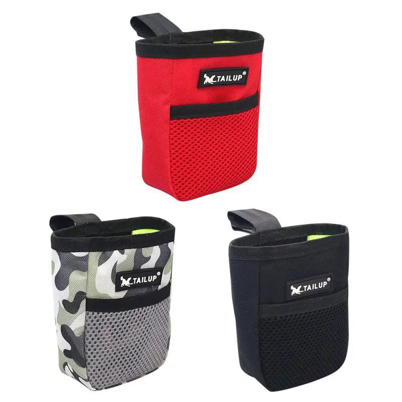 A red fabric pouch for pet training treats with a black zipper and a black and red design.