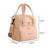 A light pink double-layer insulated lunch bag with a quilted pattern and carrying straps.