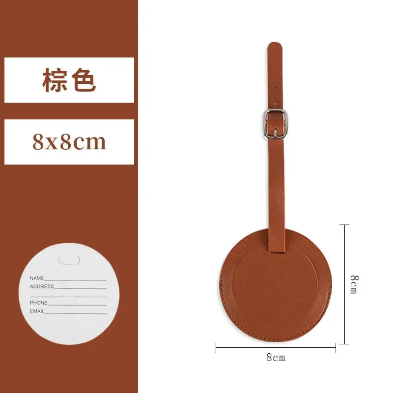 A brown PU leather luggage tag with a strap, showing its size and shape.