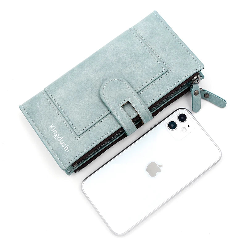 A light blue leather wallet and a white iPhone are shown together.