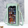 A light mint green phone pouch with a clear window displaying a smartphone and attached to a strap.
