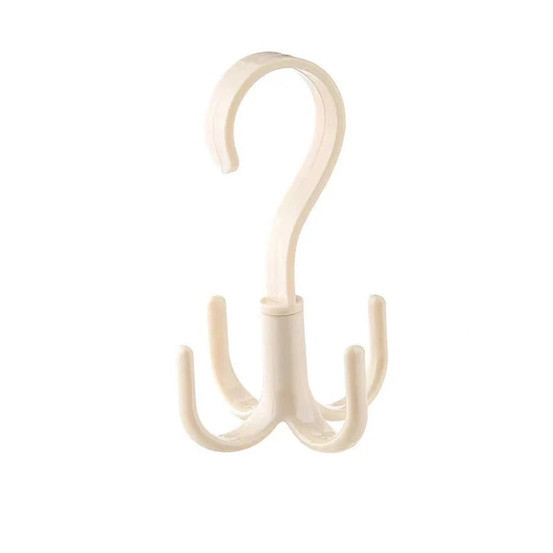 A white four-claw multi-functional hanging hook with a curved handle.