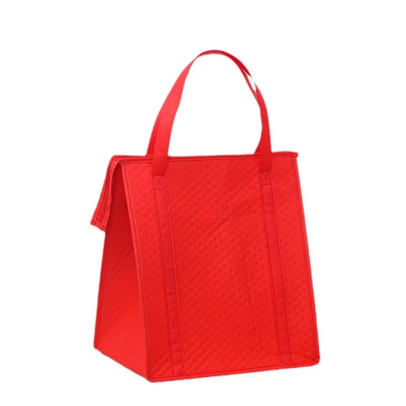 A bright red insulated tote bag with a quilted texture and a handle.