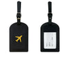 A pair of black PU leather luggage tags with gold airplane emblems and a white address section.