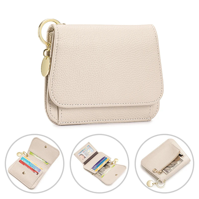 A light beige genuine leather RFID blocking women's wallet with a gold-tone chain.