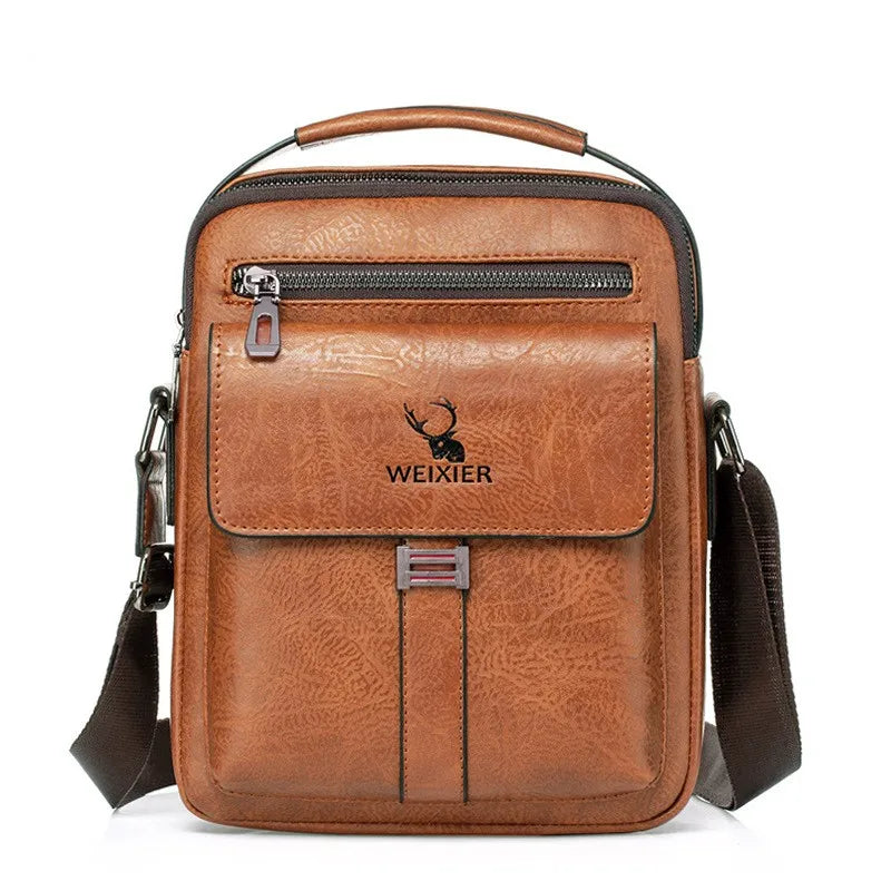 A brown vintage PU leather crossbody messenger bag with a leather handle and zipper.