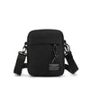 Black minimalist nylon crossbody bag for men with adjustable strap and chain detail