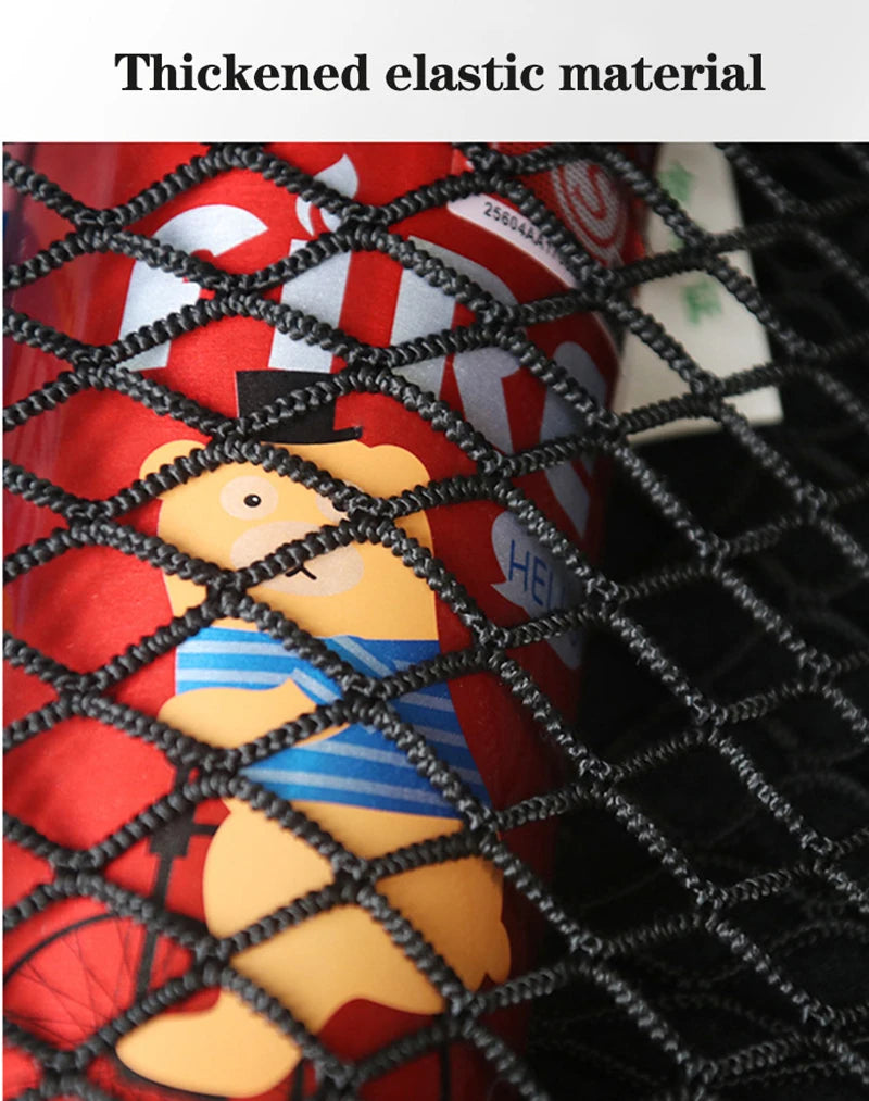 A close-up of a red container with a bear design covered in thickened elastic material, viewed through a black mesh net bag.