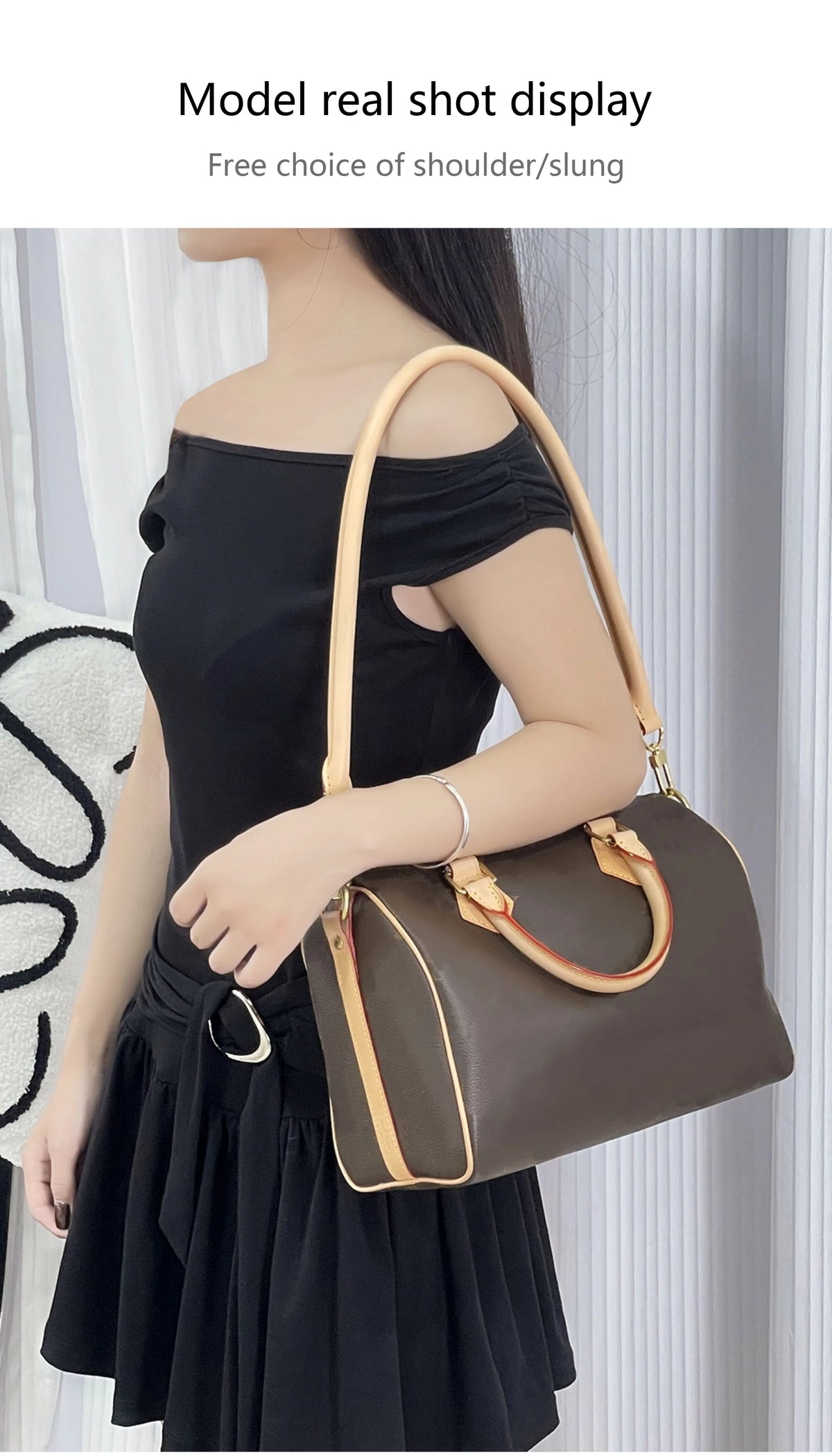 A model is shown carrying a brown leather shoulder bag with a tan strap against a white background.