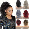 Close-up of a woman modeling 14-inch kinky curly drawstring hair extensions in black and gray shades.