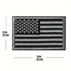A rectangular black embroidery patch featuring the design of the American flag.