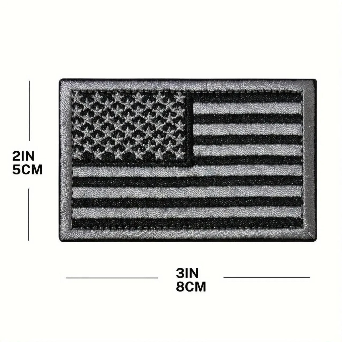 A rectangular black embroidery patch featuring the design of the American flag.