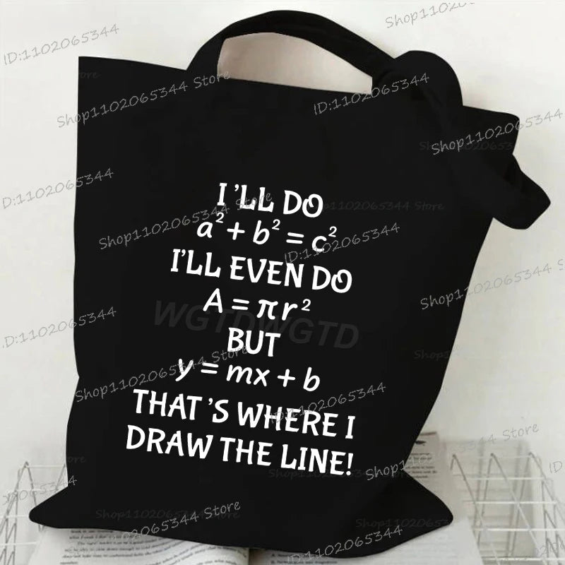 Black canvas tote bag featuring a mathematical equation written in white text