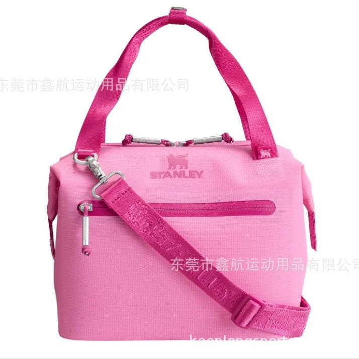 Pink insulated cooler lunch bag with a detachable crossbody strap