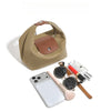 A beige nylon dumpling crossbody shoulder bag with a brown leather accent and various accessories.