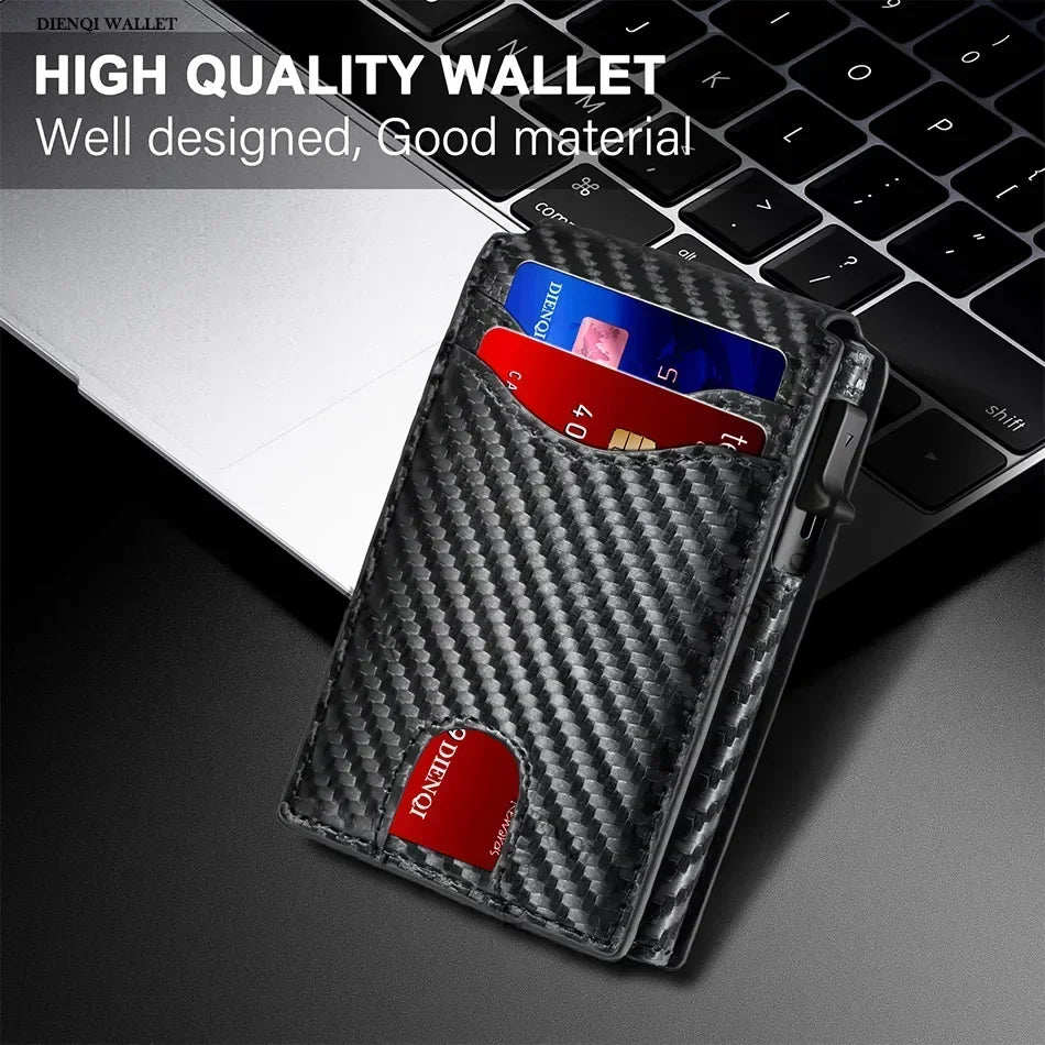 A black carbon fiber slim wallet is shown open on a dark surface next to a laptop keyboard.