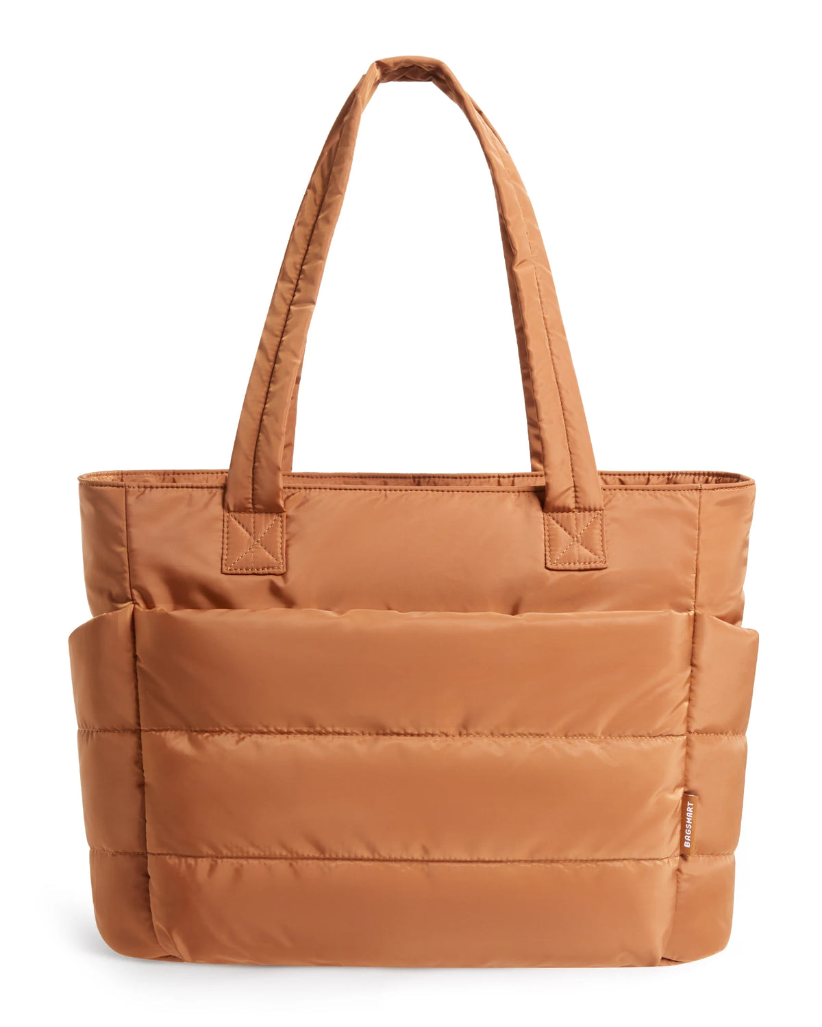 A tan quilted tote bag with a long handle is shown against a white background.