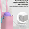 Pink double opening silicone cup holder designed for various cups, shown in a close-up view.