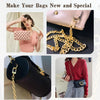 Close-up of a gold metal chain strap attached to a pink leather handbag and a black leather handbag.