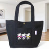 Black canvas shoulder bag featuring a Snoopy cartoon design for women
