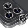 A close-up view of a silver glitter diamond camera lens protector with a metal frame for an iPhone, showing four lenses.