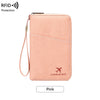 A pink multi-functional RFID blocking passport and document holder with a lanyard.