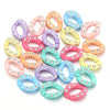 A collection of colorful acrylic link chains in various pastel shades like pink, purple, yellow, and blue.