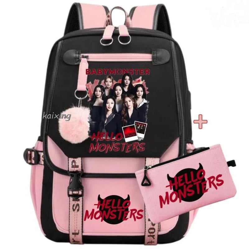 Rosa und schwarz gemustetes Rucksackset mit Hello Monsters-Grafiken für Schüler.