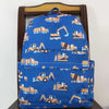 Blue backpack featuring an all-over pattern of yellow and orange construction vehicles like trucks and excavators.