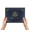 Elegant birth certificate holder with a dark blue PU leather cover featuring a gold emblem.