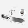 A silver portable digital luggage scale with a handle and measuring markings.