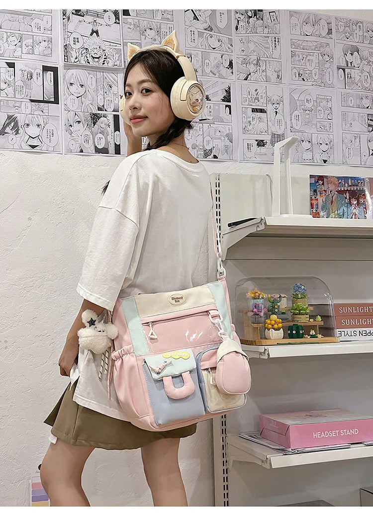 A young woman models a pink and white Kawaii Harajuku backpack with a laptop compartment in a retail display.