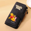 A black zippered pouch featuring a Winnie the Pooh design with the word Forever.