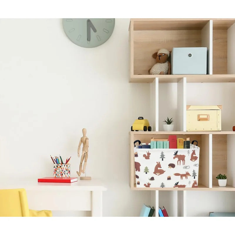 A wooden shelf unit displaying a light blue storage box, a stuffed animal, and various toys in a white basket.