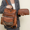 A woman holds a brown retro PU leather travel backpack with a leopard print panel and a matching clutch.