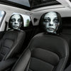 A set of car headrest covers featuring realistic, distressed ghost faces on black leather seats.