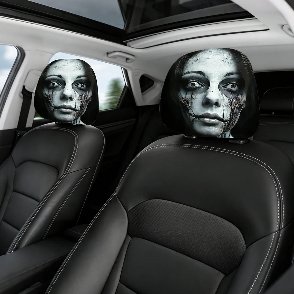 A set of car headrest covers featuring realistic, distressed ghost faces on black leather seats.