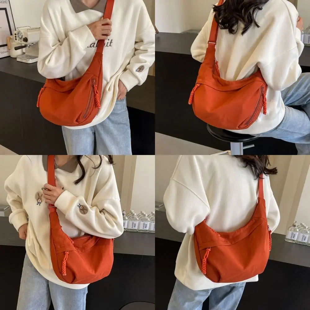 A person is holding an orange canvas crossbody bag against a white sweatshirt, shown in multiple angles.