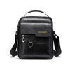 Black leather crossbody messenger bag with gold lettering and adjustable strap.